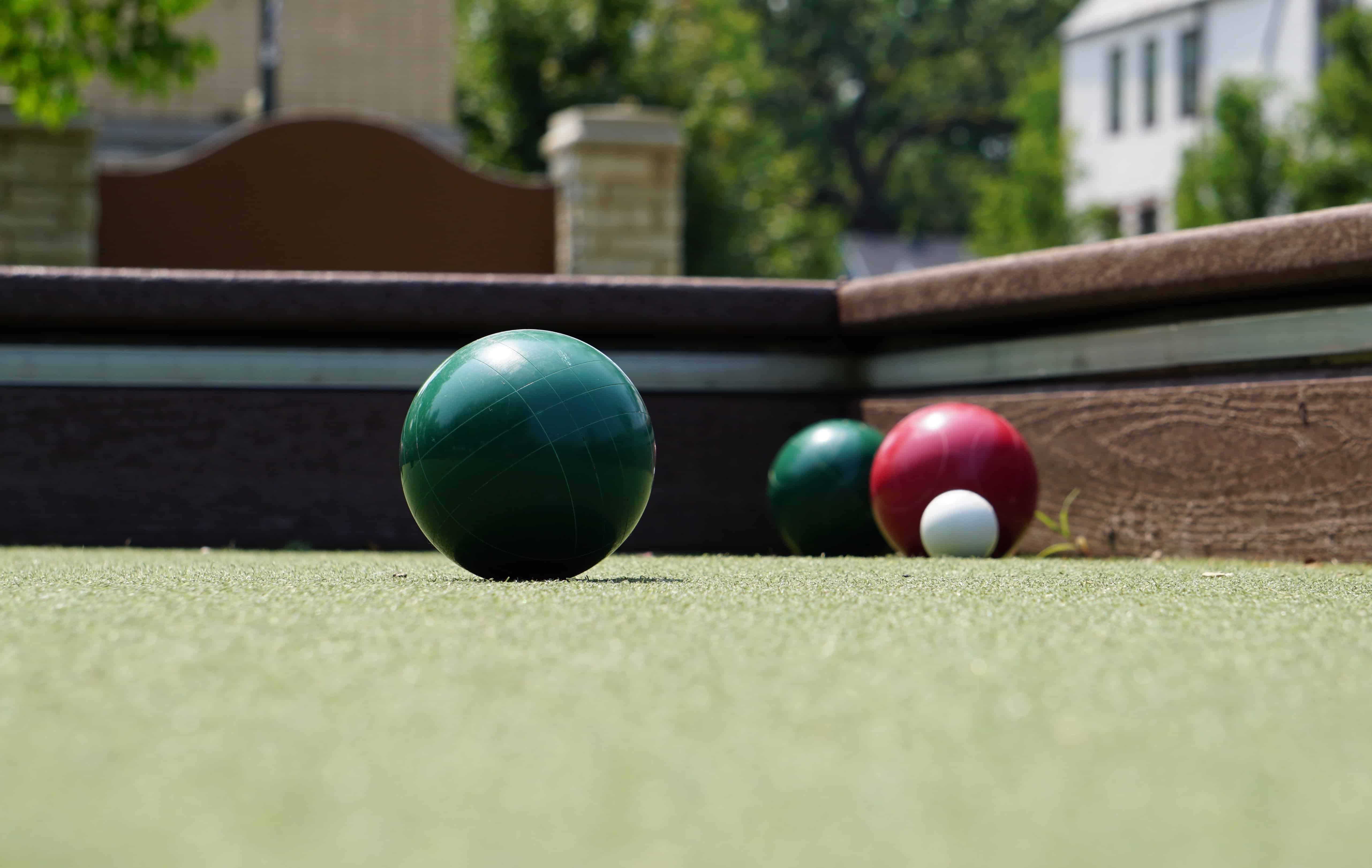close-up of bocce balls on court